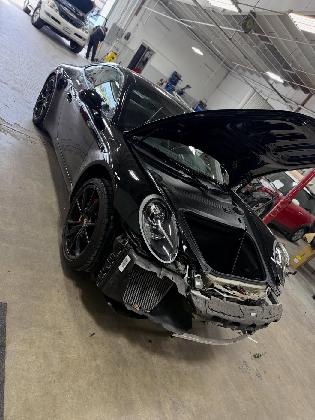 Before repair: Porsche 911 — bumper repair